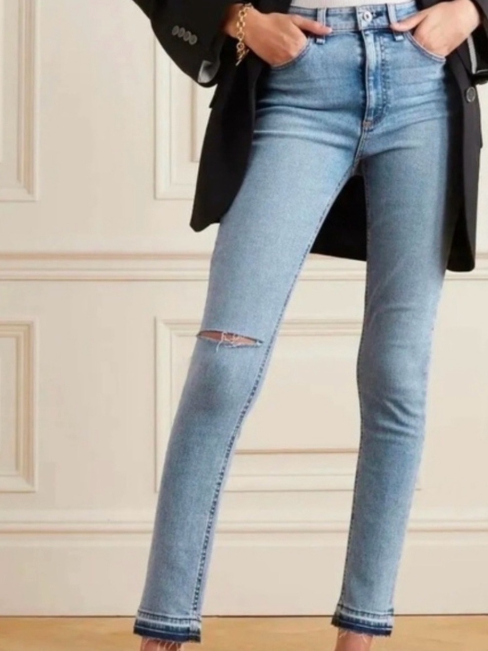 DESIGNER RAG & BONE light blue high-rise skinny jeans with knee slit.